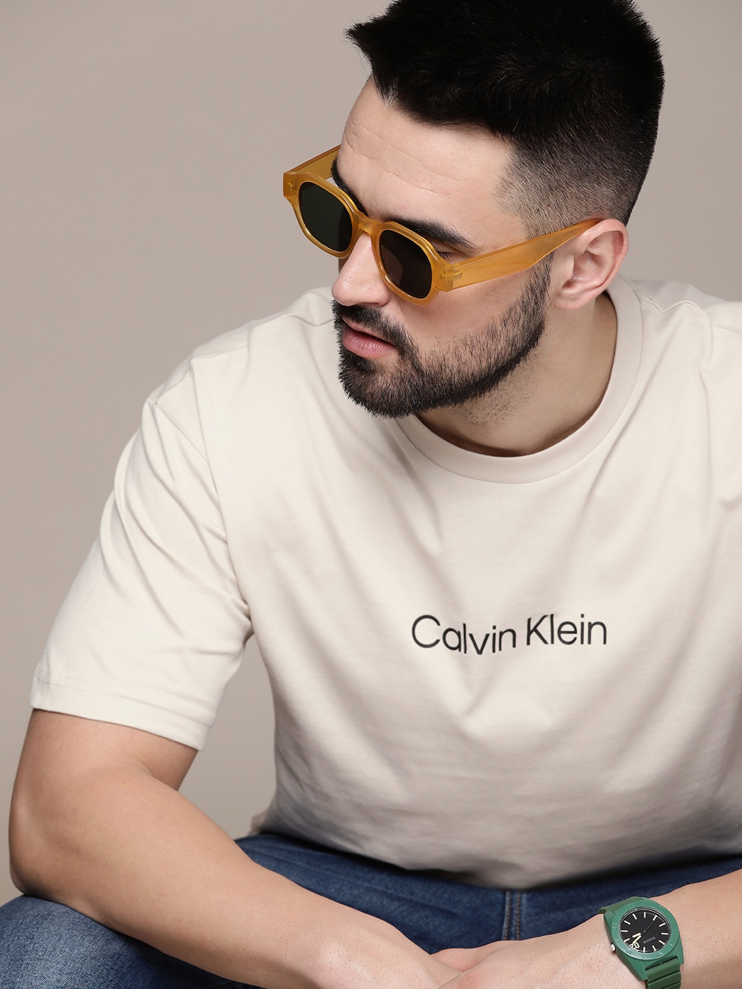 

Calvin Klein Jeans Pure Cotton Round Neck Solid Casual T-shirt, Beige