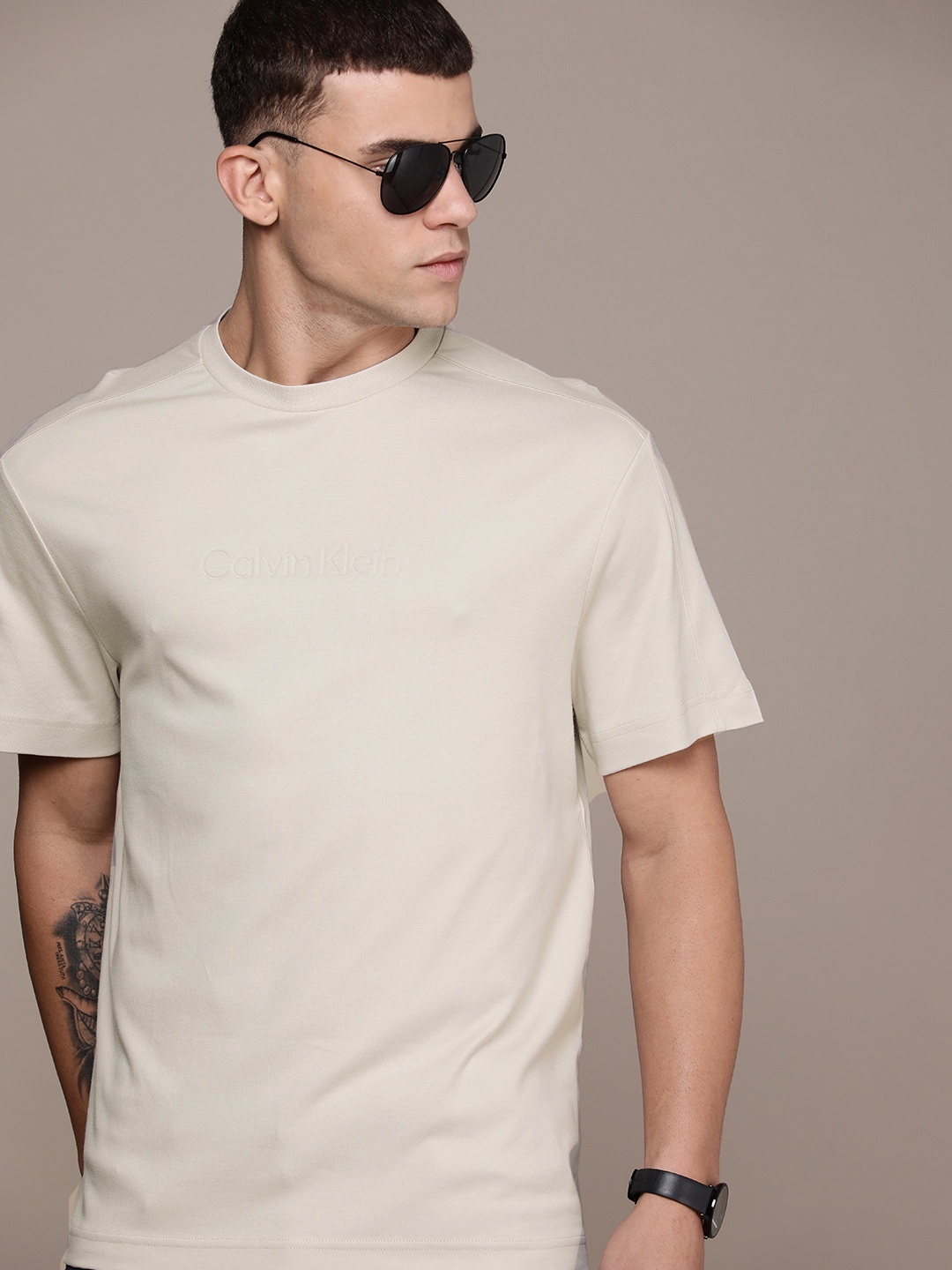 

Calvin Klein Jeans Relaxed Fit Brand Logo Debossed Detail Pure Cotton T-shirt, Beige