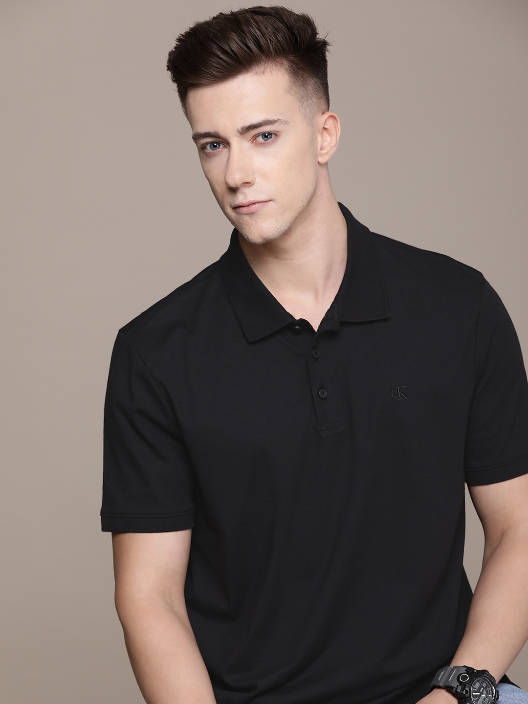 

Calvin Klein Jeans Solid Polo Collar Casual T-shirt, Black