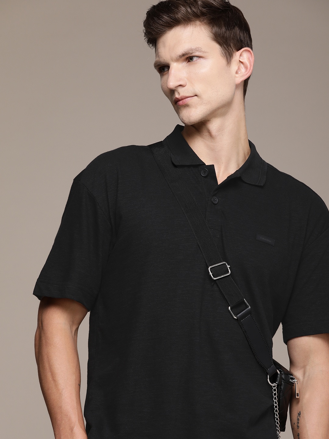 

Calvin Klein Jeans Solid Polo Collar Casual T-shirt, Black