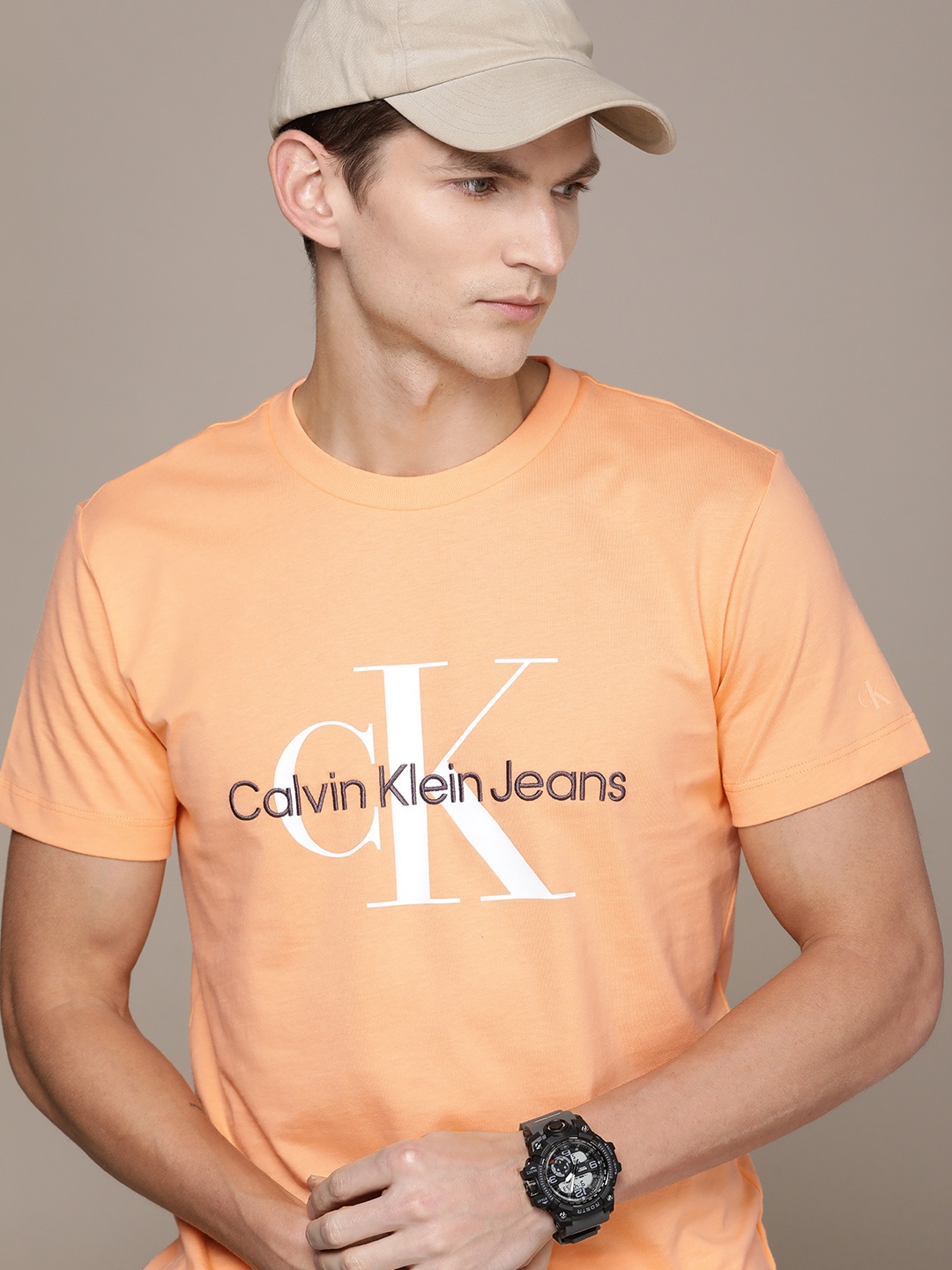 

Calvin Klein Jeans Brand Logo Printed Pure Cotton T-shirt, Orange