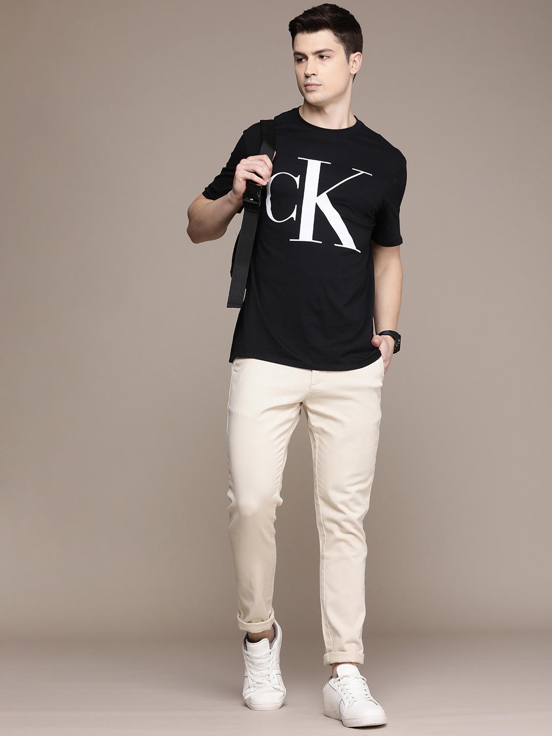 

Calvin Klein Jeans Brand Logo Printed Pure Cotton T-shirt, Black
