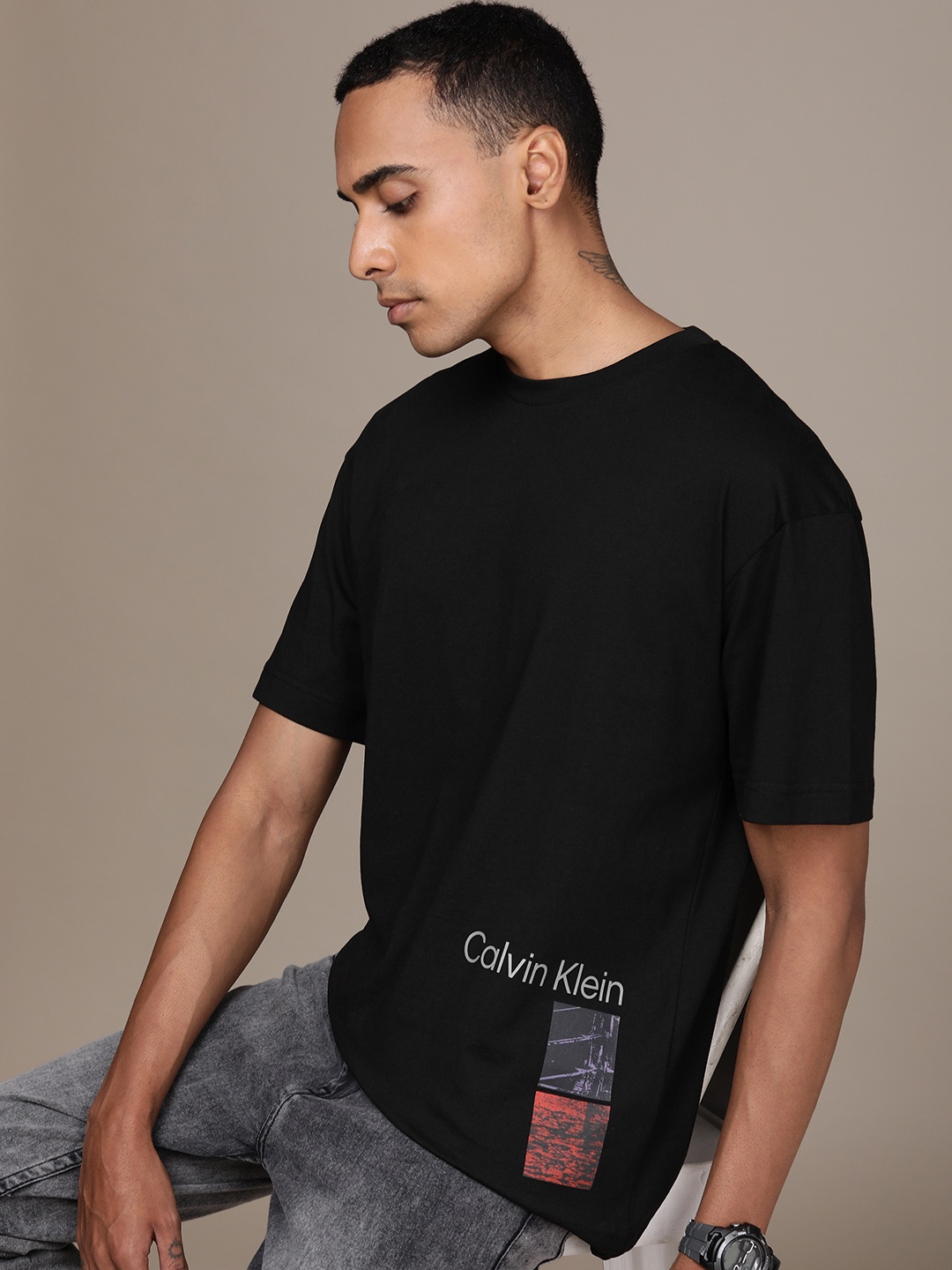 

Calvin Klein Jeans Brand Logo Printed Drop-Shoulder Pure Cotton T-shirt, Black