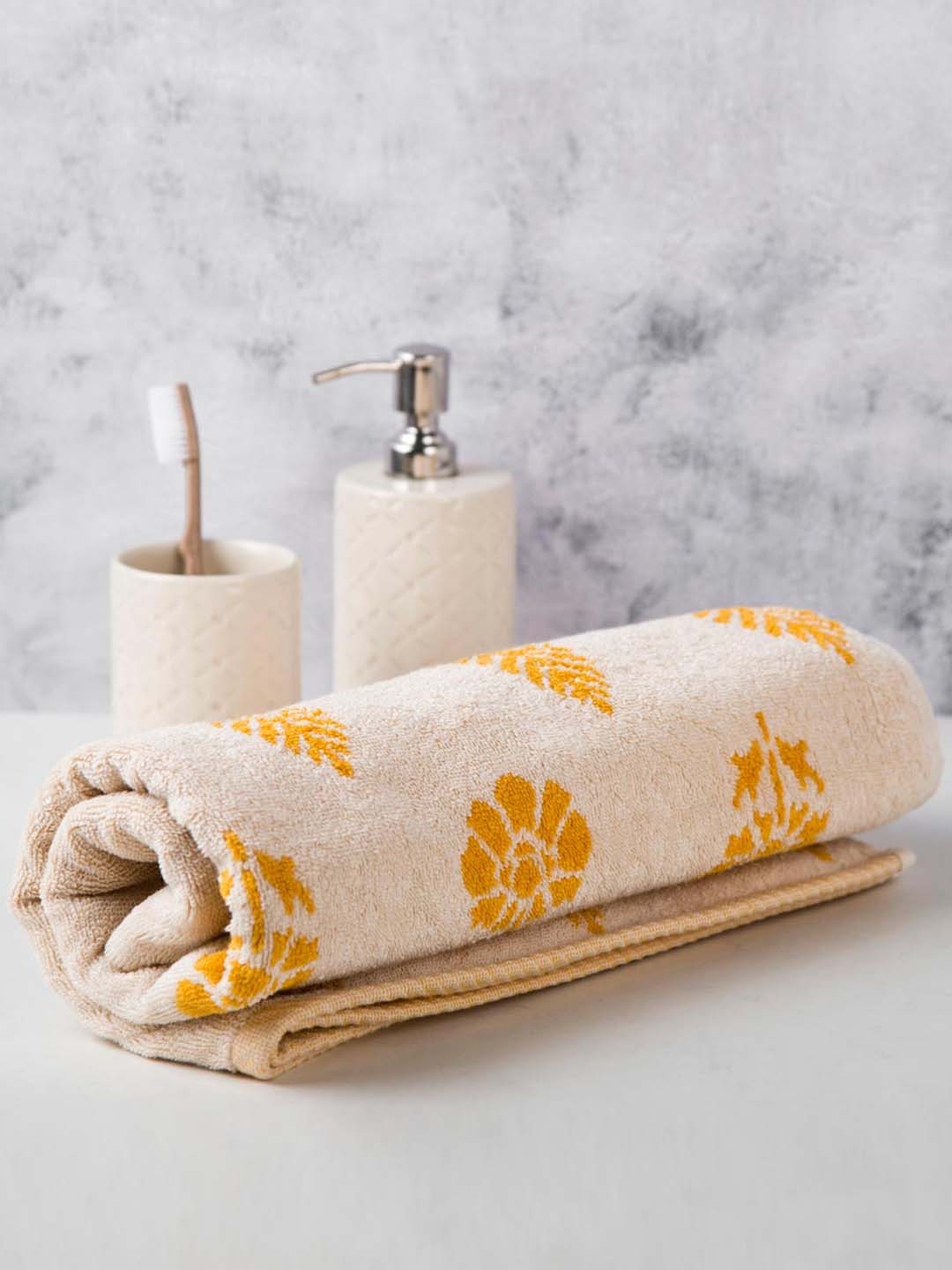 

Fabindia Beige & Yellow Printed 550 GSM Cotton Bath Towel