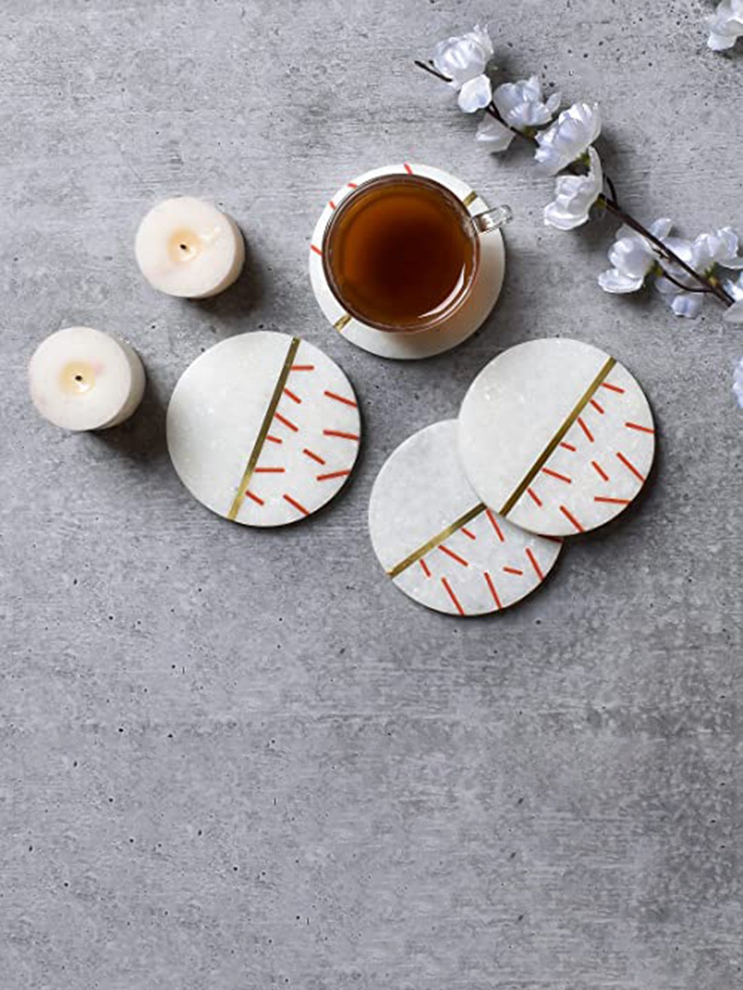 

Perpetual 4-Pcs White Textured Marble Round Coasters With Brass Inlay Work