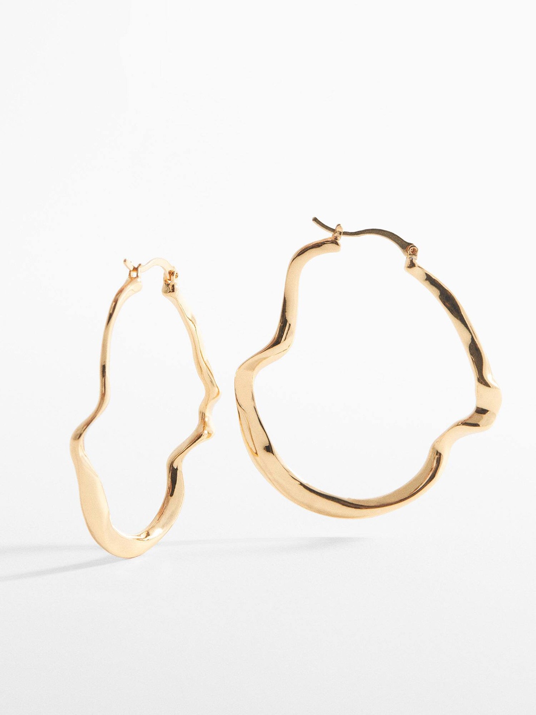 

MANGO Women Twisted Design Contemporary-Shaped Hoop Earrings, Gold
