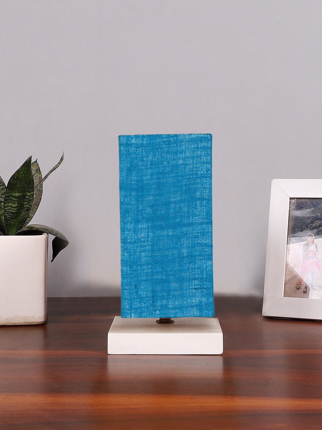 

Devansh Turquoise-Blue & White Textured Jute Table Lamp With Wooden Base