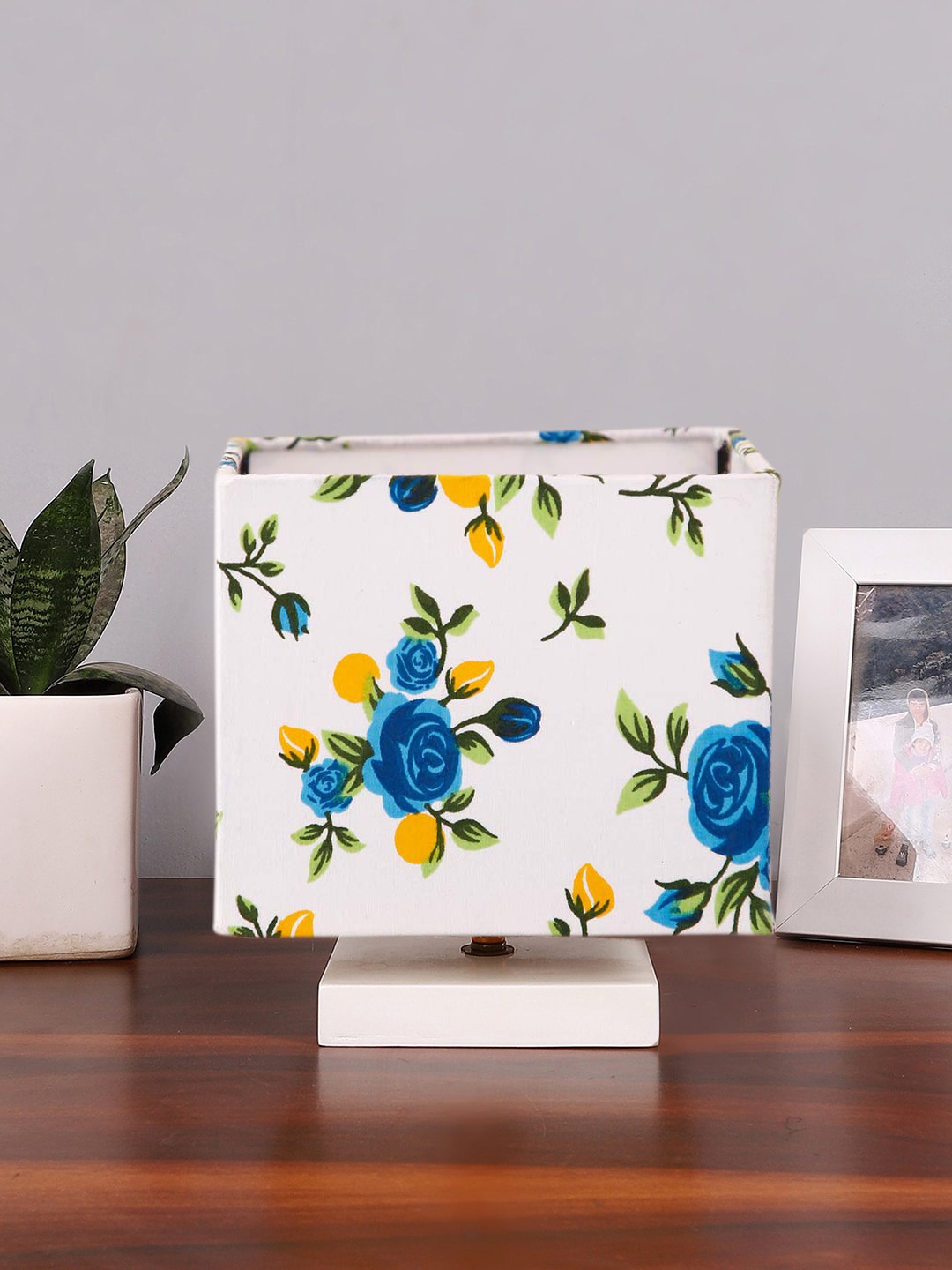 

Devansh White & Blue Printed Cotton Table Lamp With Wooden Base