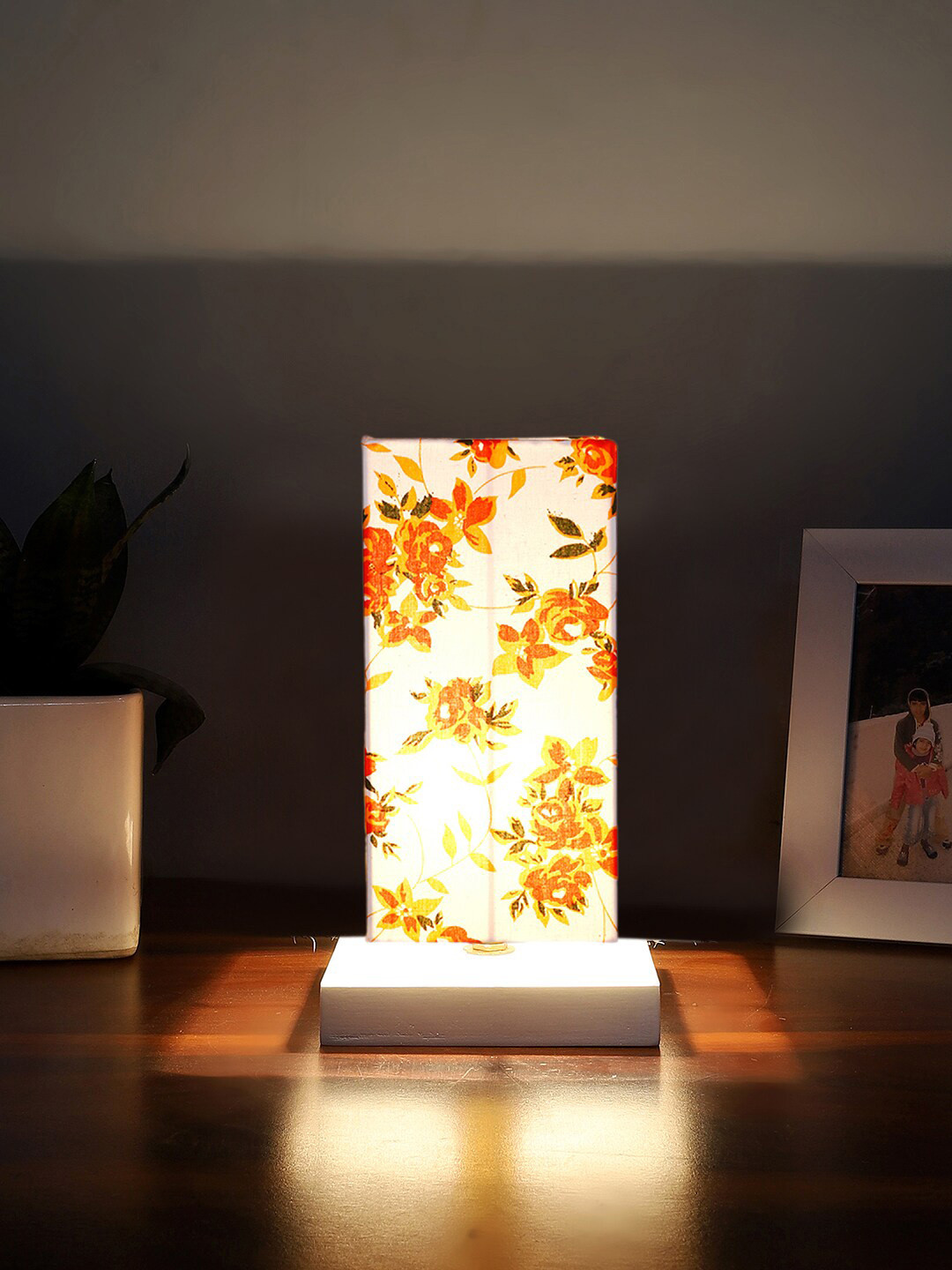 

Devansh White & Orange Floral Printed Cotton Square Table Lamp With Wood Base
