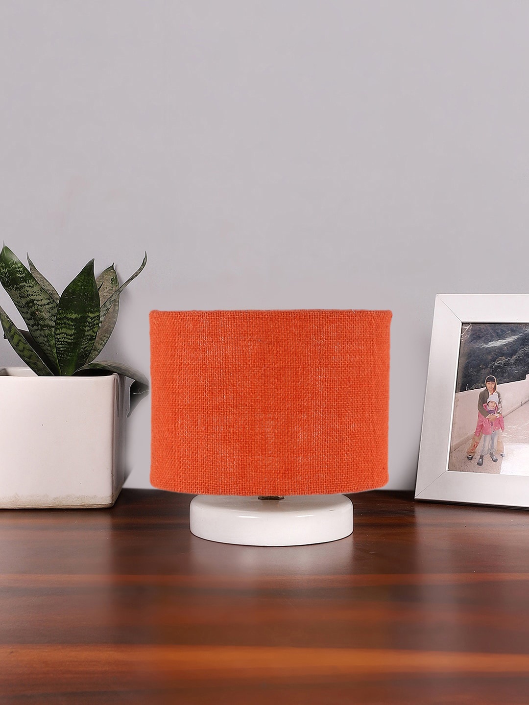 

Devansh Orange-Coloured & White Textured Jute Table Lamp With Wooden Base