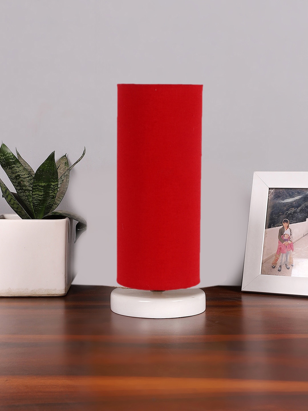 

Devansh Red & White Cotton Table Lamp With Wooden Base