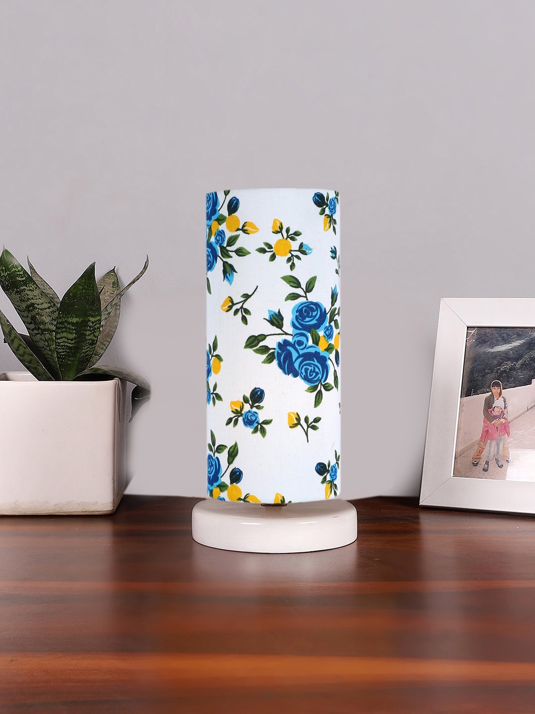 

Devansh White & Blue Printed Cotton Table Lamp With Wooden Base