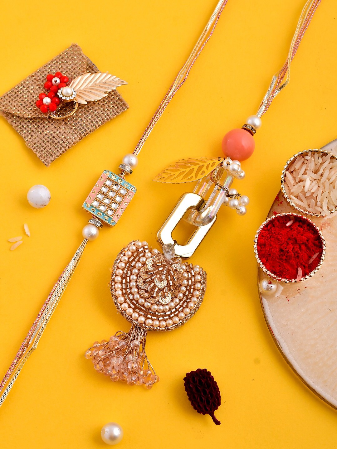 

Aapno Rajasthan Set Of 2 Pearls Beaded Bhaiya Bhabhi Rakhi, Gold