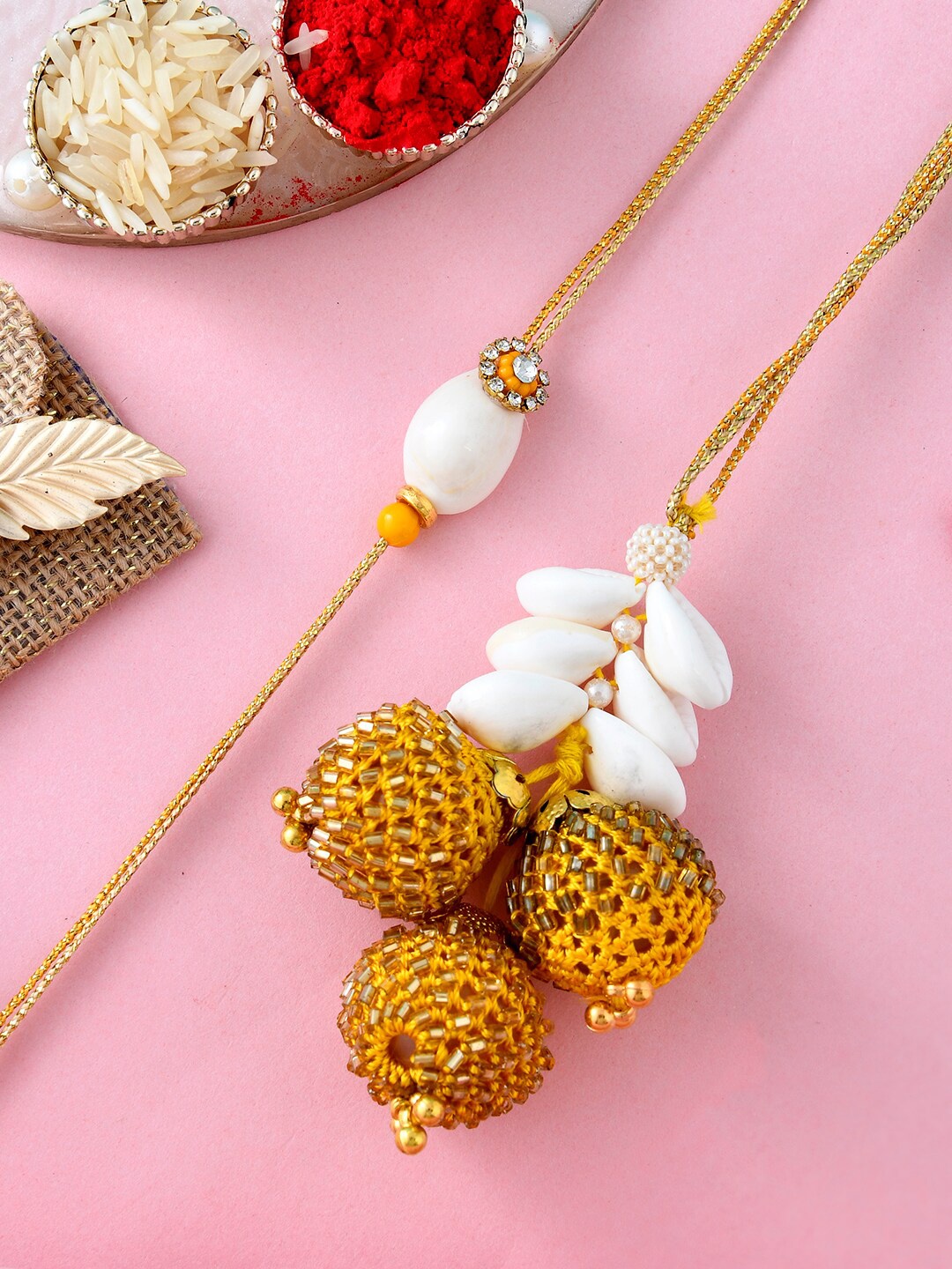 

Aapno Rajasthan Set Of 2 Beadded Bhaiya Bhabhi Rakhi With Roli & Chawal, Gold