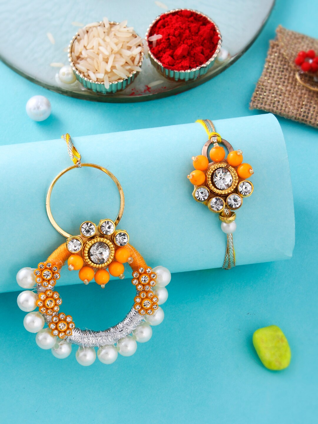 

Aapno Rajasthan Unisex Set Of 2 Stone Studded & Beaded Bhaiya Bhabhi Rakhis, Yellow
