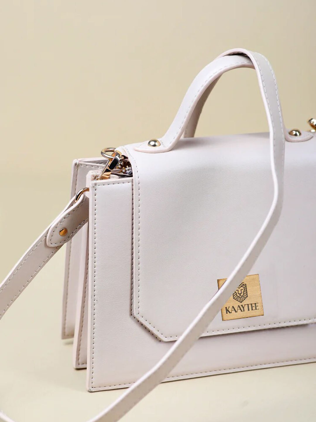 

KAAYTEE Structured Sling Bag with Detachable Sling Strap, Cream