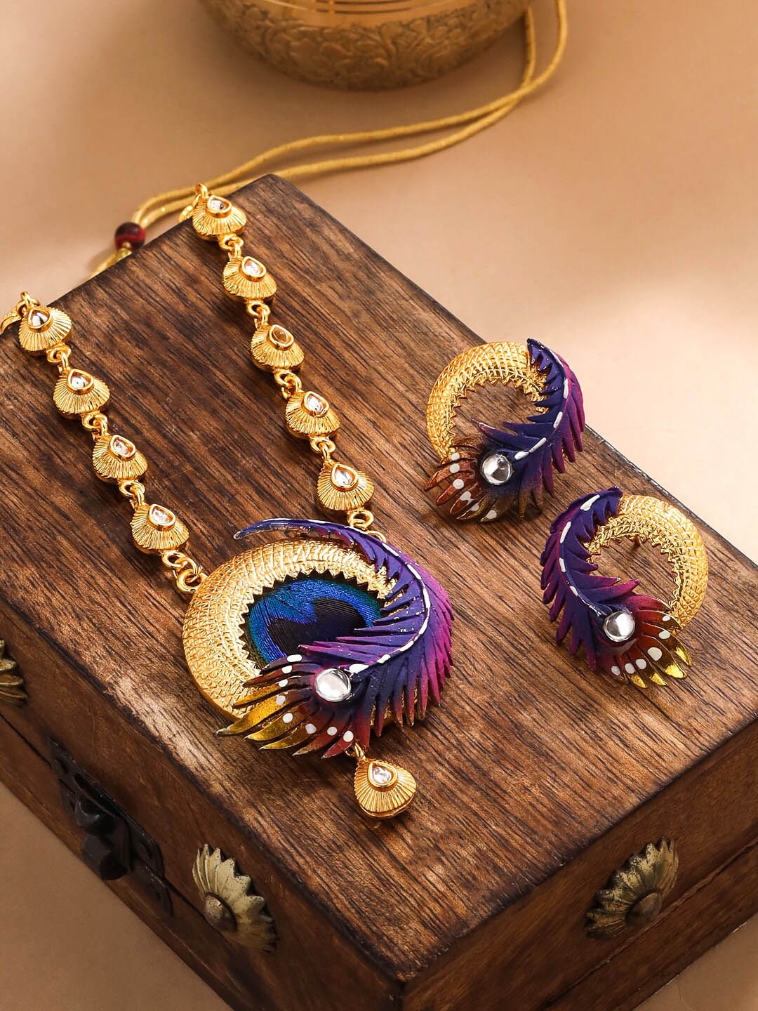 

Yellow Chimes Gold-Plated Stone-Studded Jewellery Set