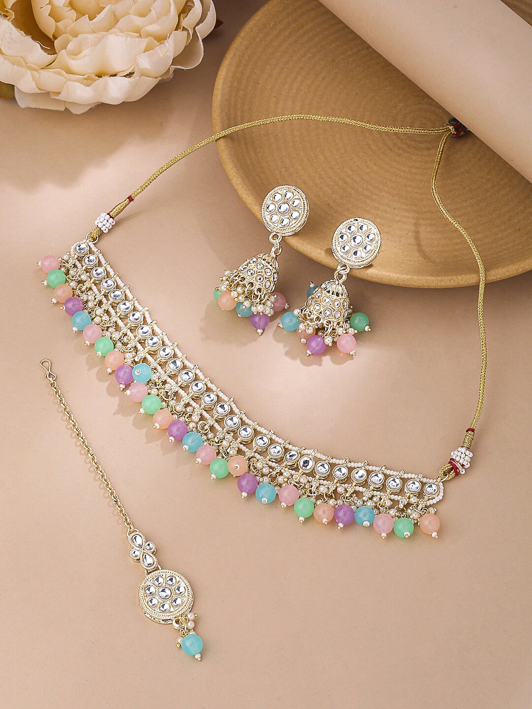 

Yellow Chimes Gold-Plated Kundan-Studded & Pearl Beaded Jewellery Set