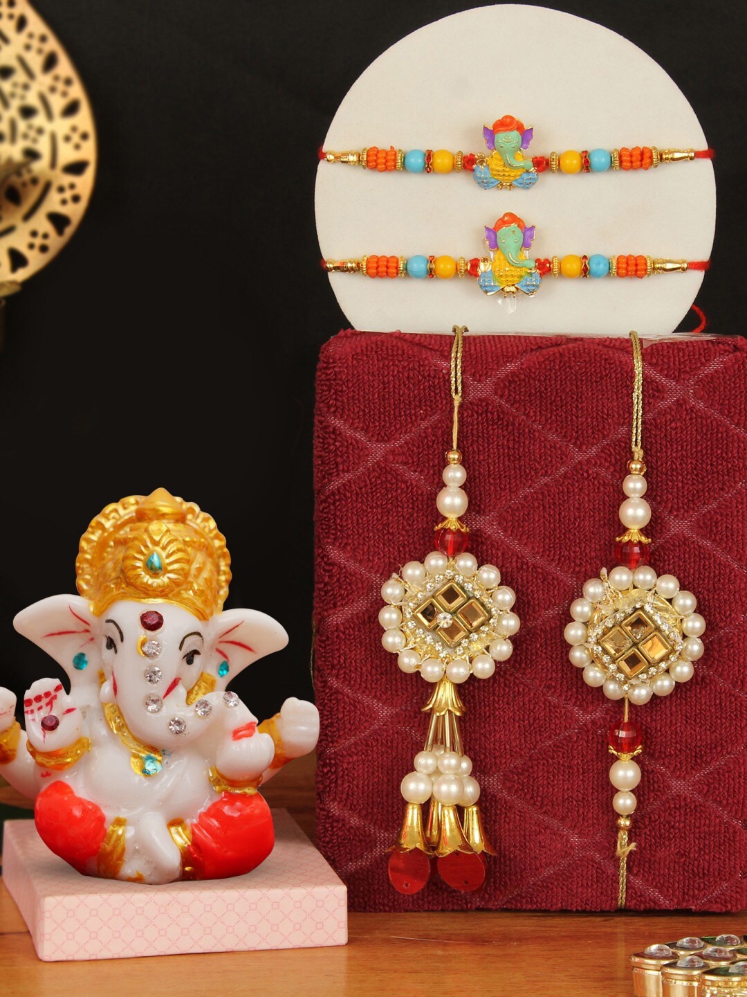 

TIED RIBBONS Men Set of 4 Bhaiya Bhabhi & Kids Family Rakhi Set with Ganesha Idol, Gold