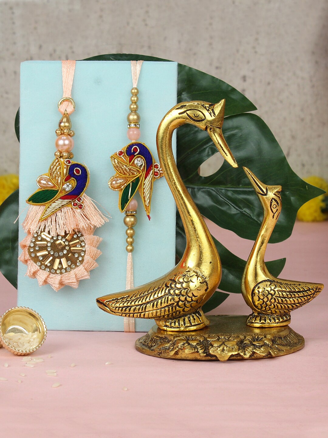 

TIED RIBBONS Lumba Rakhi for Brother and Bhabhi with Small Kissing Duck Statue Gift Set, Pink