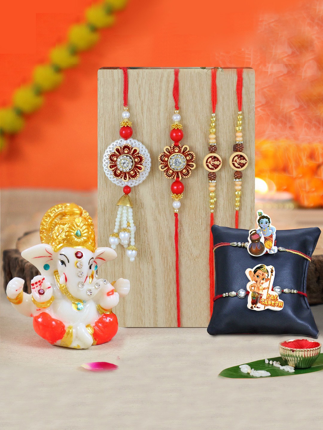 

TIED RIBBONS Set of 4 Family Rakhi Set With Ganesha Idol Gift Set, Red