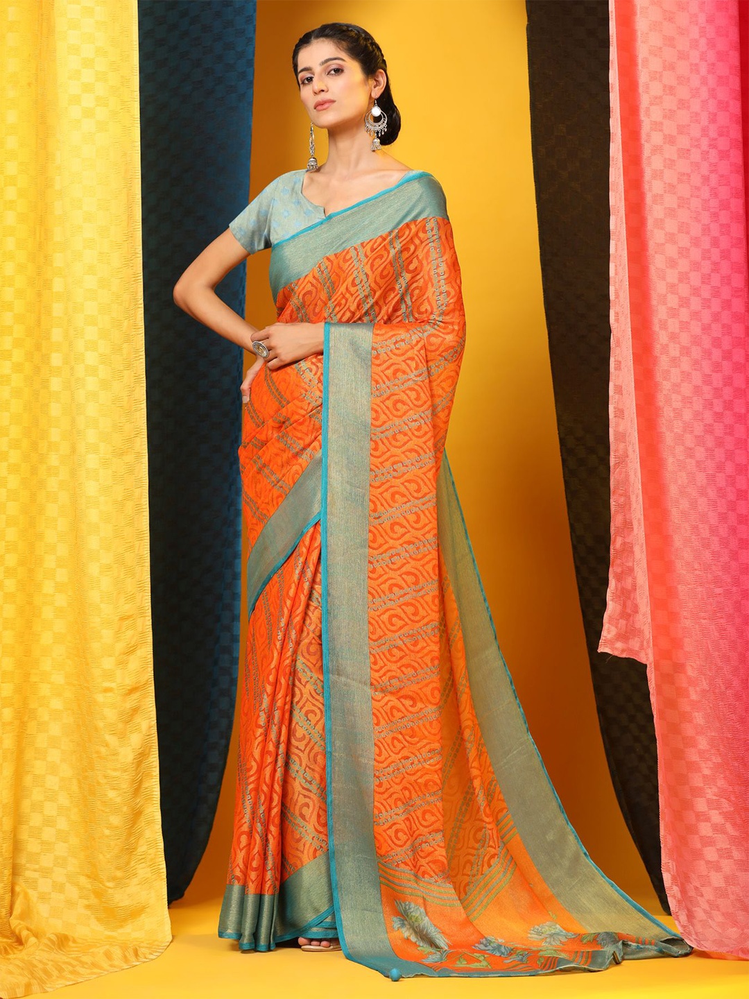 

Phenav Ethnic Motifs Zari Brasso Patola Saree With Blouse Piece, Orange