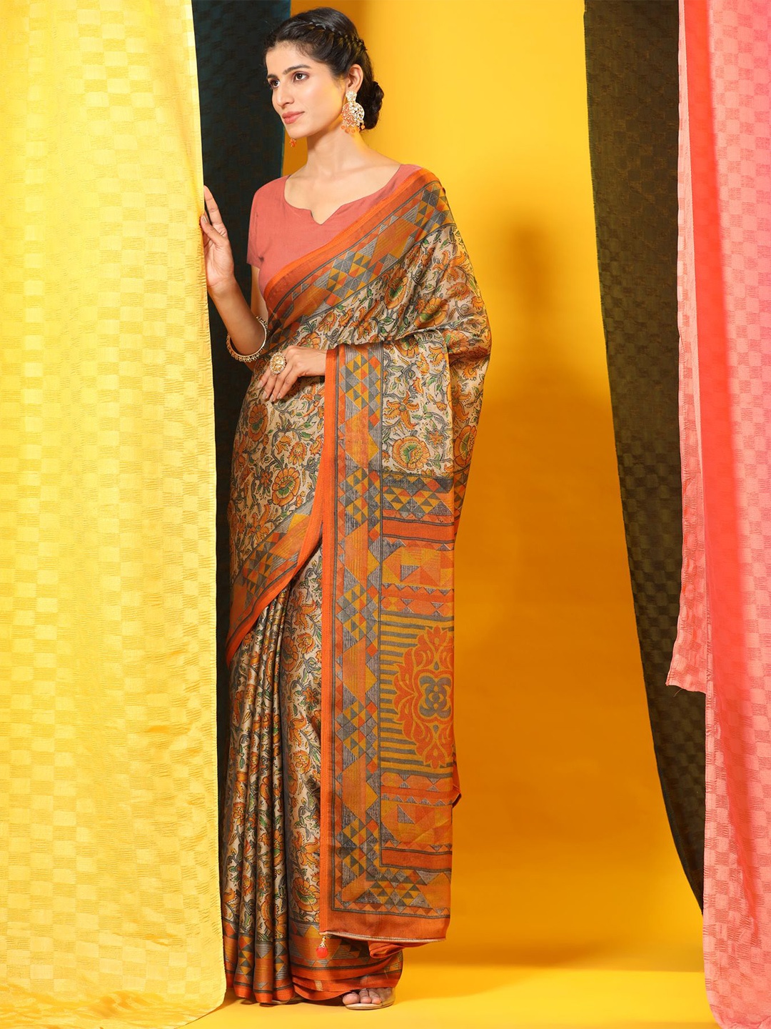 

Phenav Ethnic Motifs Printed Brasso Patola Saree, Orange