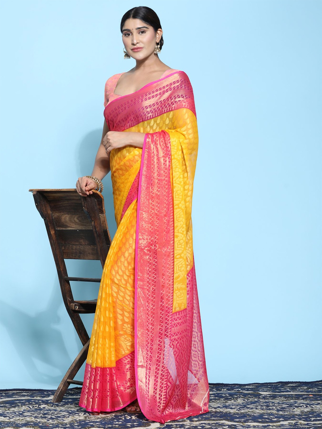 

Phenav Ethnic Motifs Woven Design Zari Brasso Patola Saree, Yellow