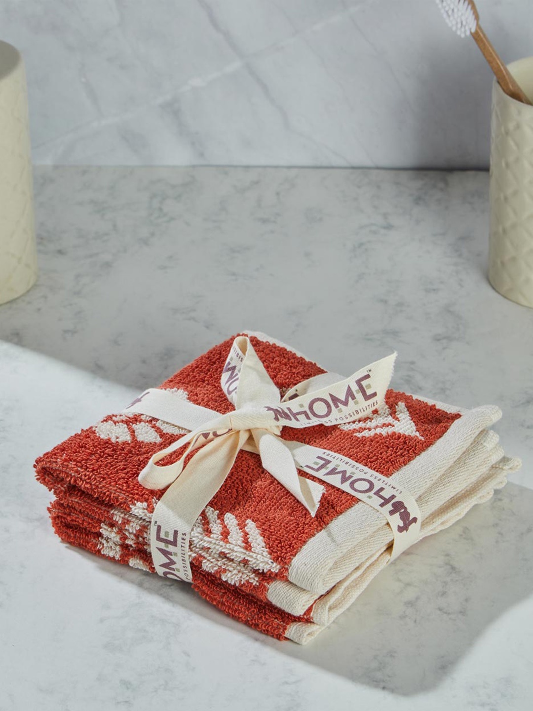 

Fabindia Rust & Beige 2 Pieces Printed 550 GSM Cotton Face Towels
