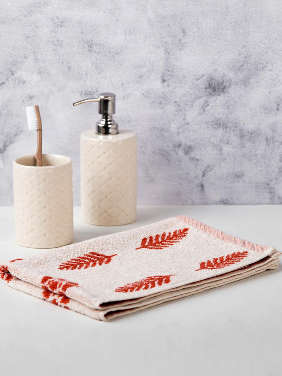 

Fabindia Rust Siena Buti Cotton Woven 550 GSM Rectangular Hand Towel