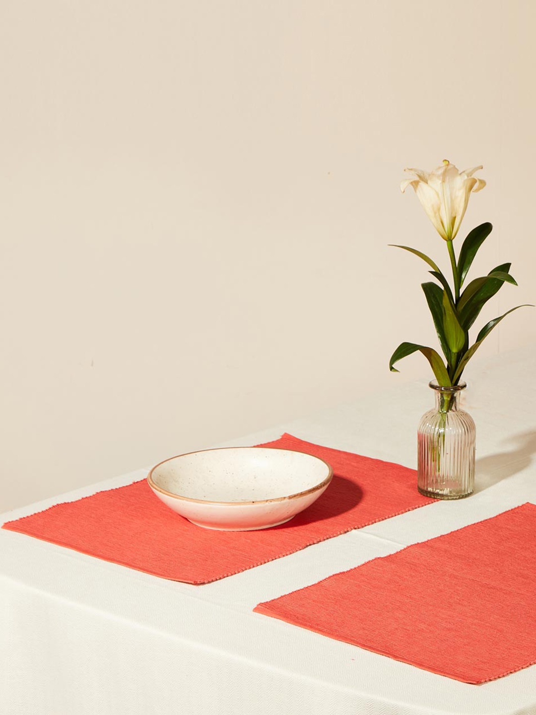 

Fabindia Coral Colored 6 Pieces Self Design Cotton Table Placemats