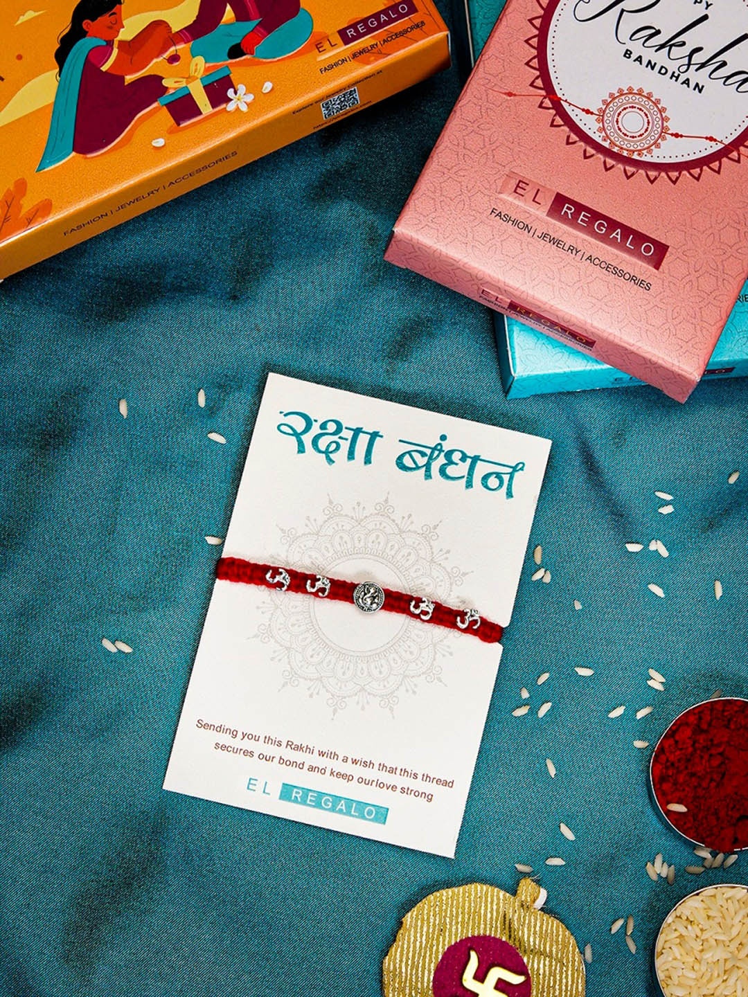 

EL REGALO Men Om Charm Rakhi With Roli & Chawal, Red