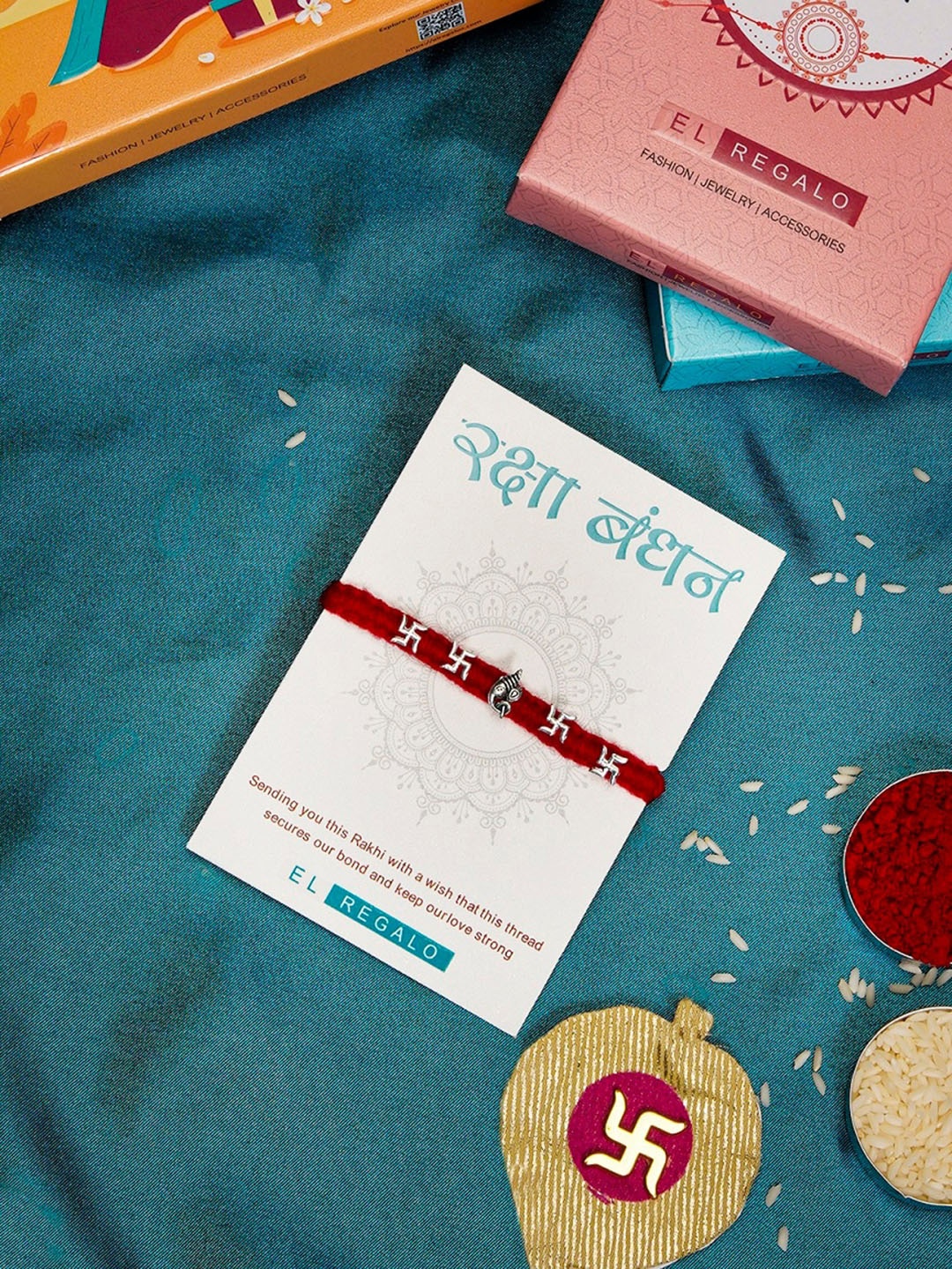 

EL REGALO Om Charm Details Bhai Rakhi With Roli & Chawal, Red