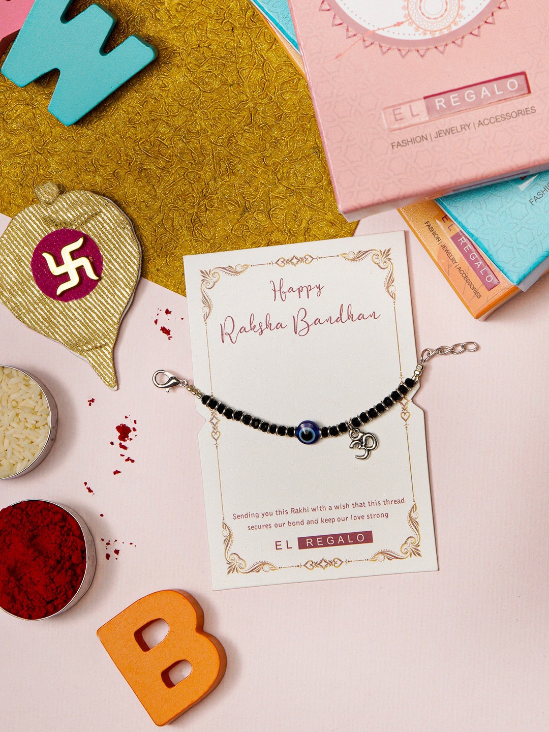 

EL REGALO Baby Evil Eye Rakhi with Roli Rice and Rakhi card, Black