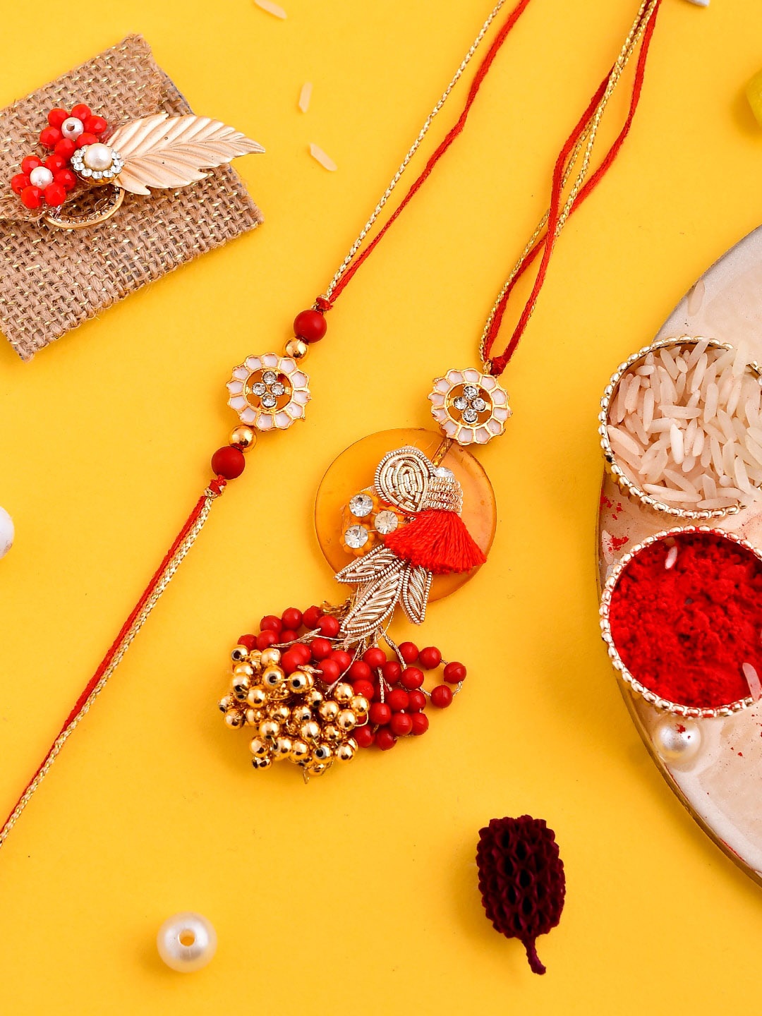 

Aapno Rajasthan Set Of 2 Beaded Zardozi Rakhis With Roli Chawal & Box, Orange