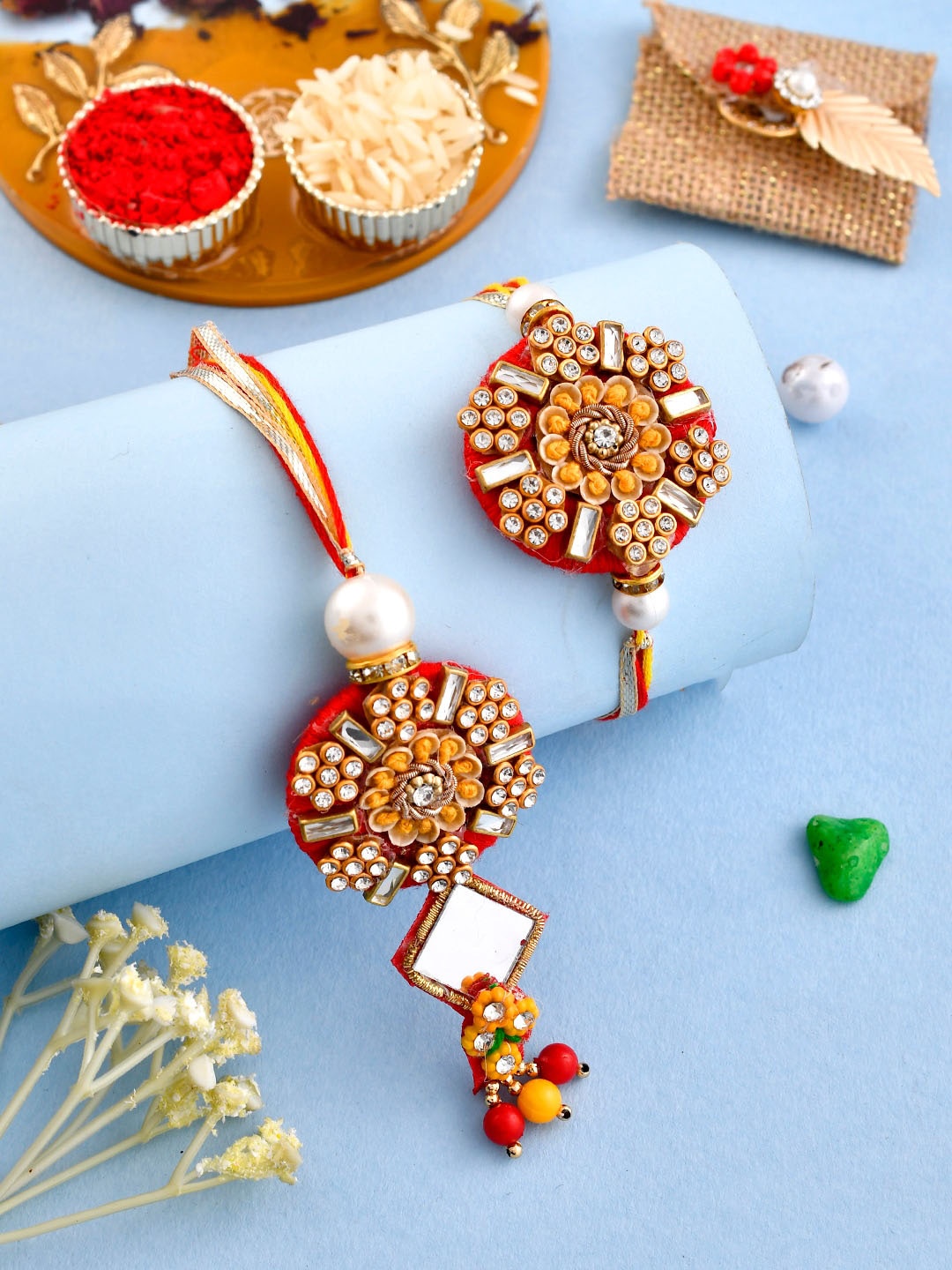 

Aapno Rajasthan Set of 2 Stone-Studded & BeadedRakhis With Roli, Chawal & Card, White