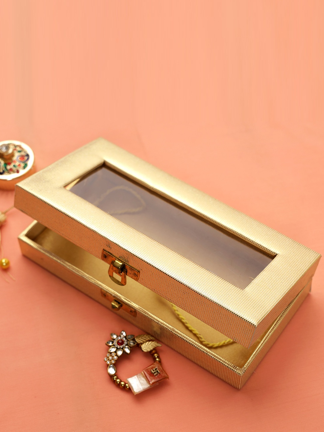 

Aapno Rajasthan Set of 2 Stone-Studded & Beaded Rakhis With Roli, Chawal&Card, Gold