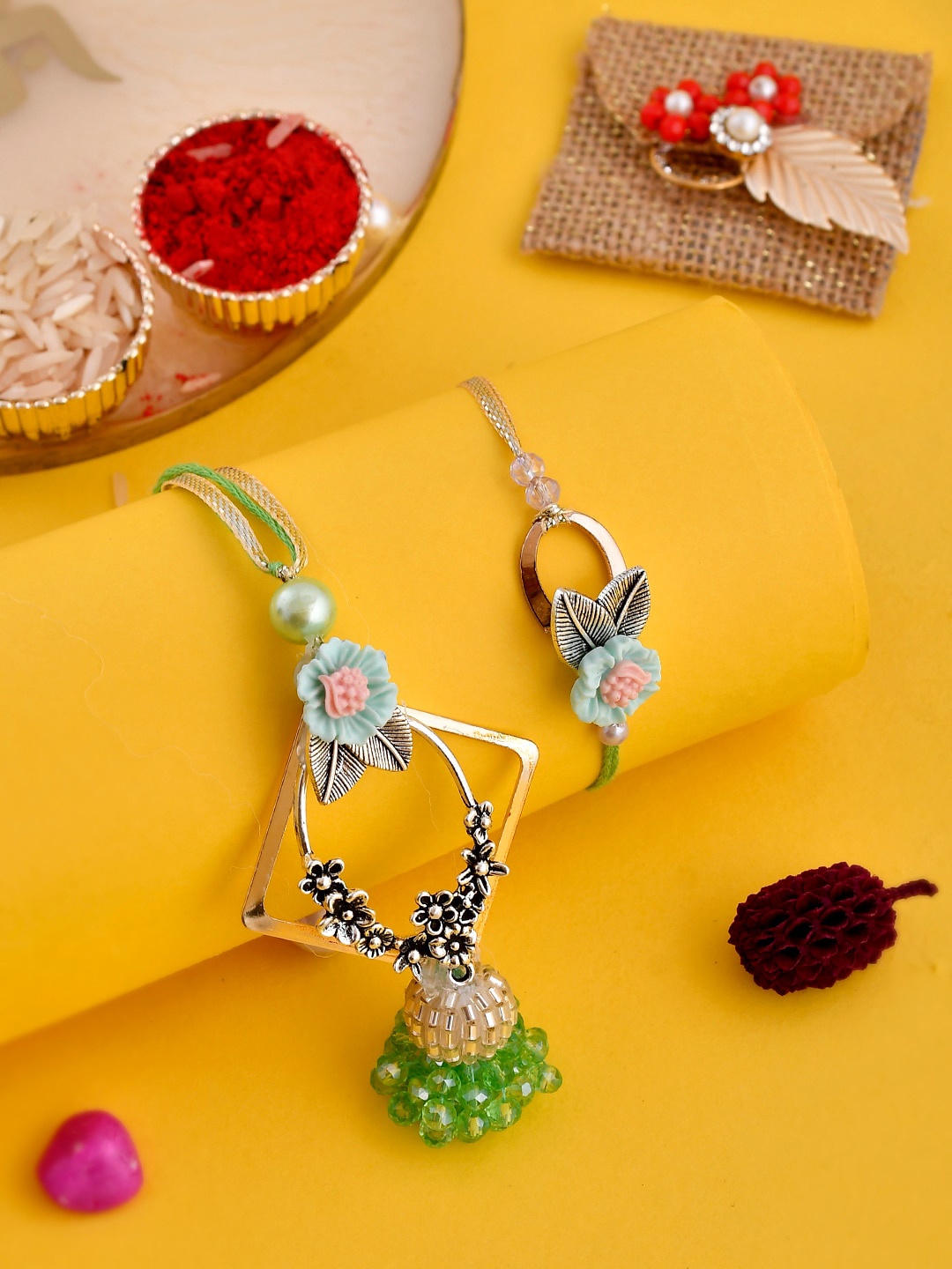 

Aapno Rajasthan Set Of 2 Pearl Embellished Bhaiya Bhabhi Rakhi Set With Box, Green