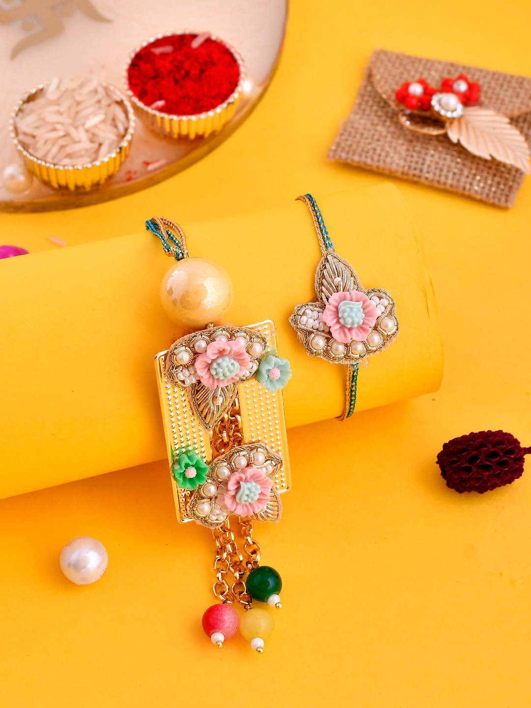 

Aapno Rajasthan Set Of 2 Pearl Embellished Bhaiya Bhabhi Rakhi Set With Box, Beige