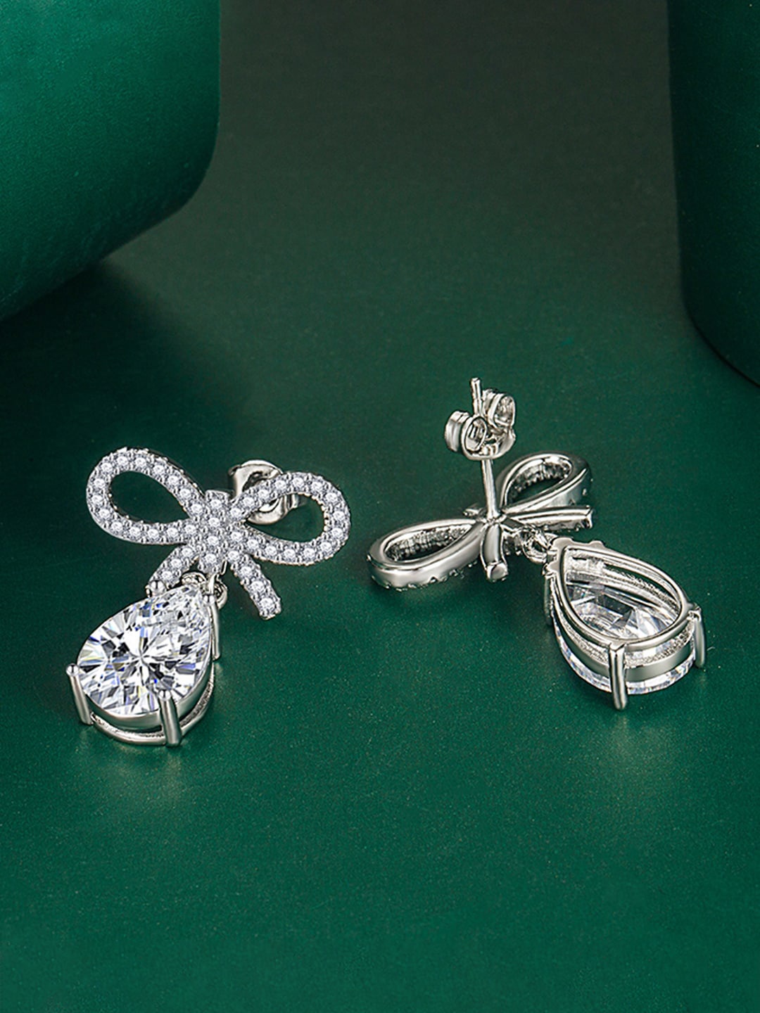 

Designs & You Silver-Plated Teardrop Shaped Studs Earrings
