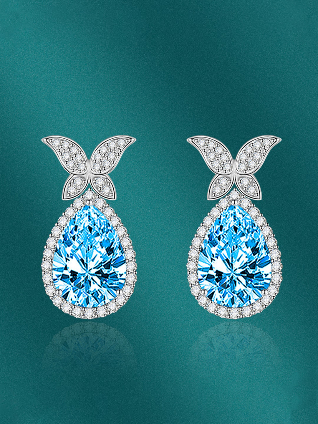 

Designs & You Silver-Plated Teardrop Shaped Drop Earrings