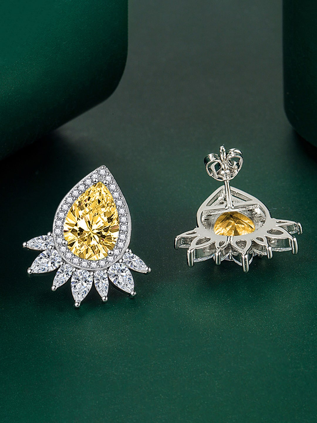 

Designs & You Silver-Plated Contemporary Studs Earrings