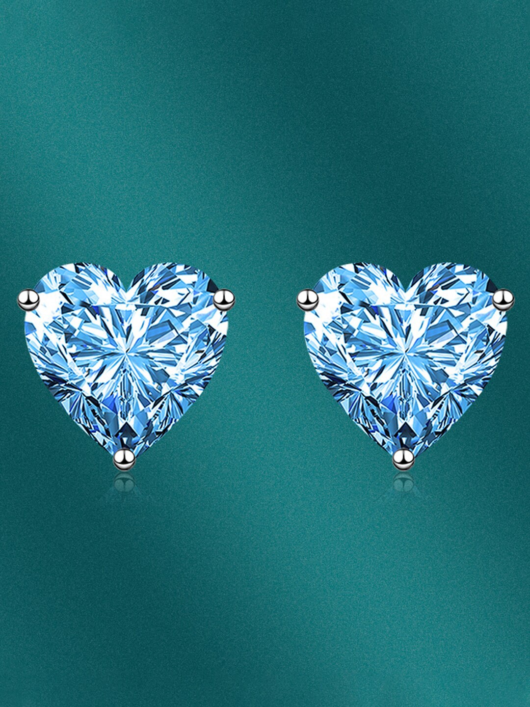 

Designs & You Heart Shaped Studs Earrings, Blue