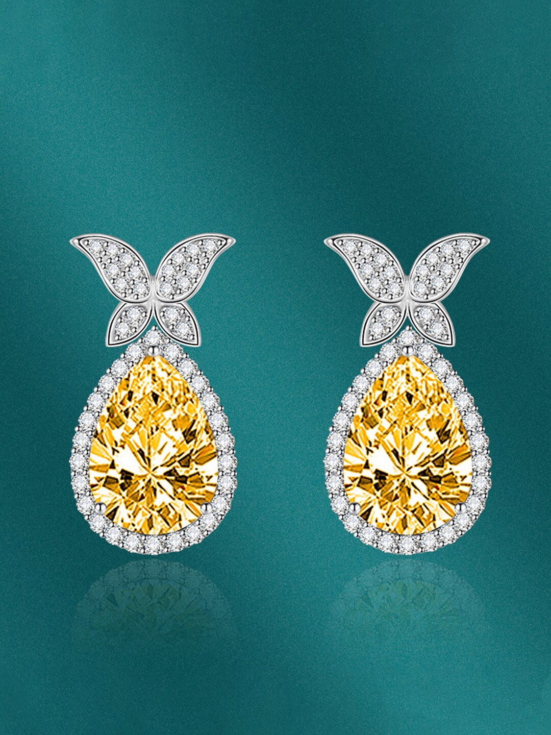 

Designs & You Silver Plated Teardrop Shaped Drop Earrings