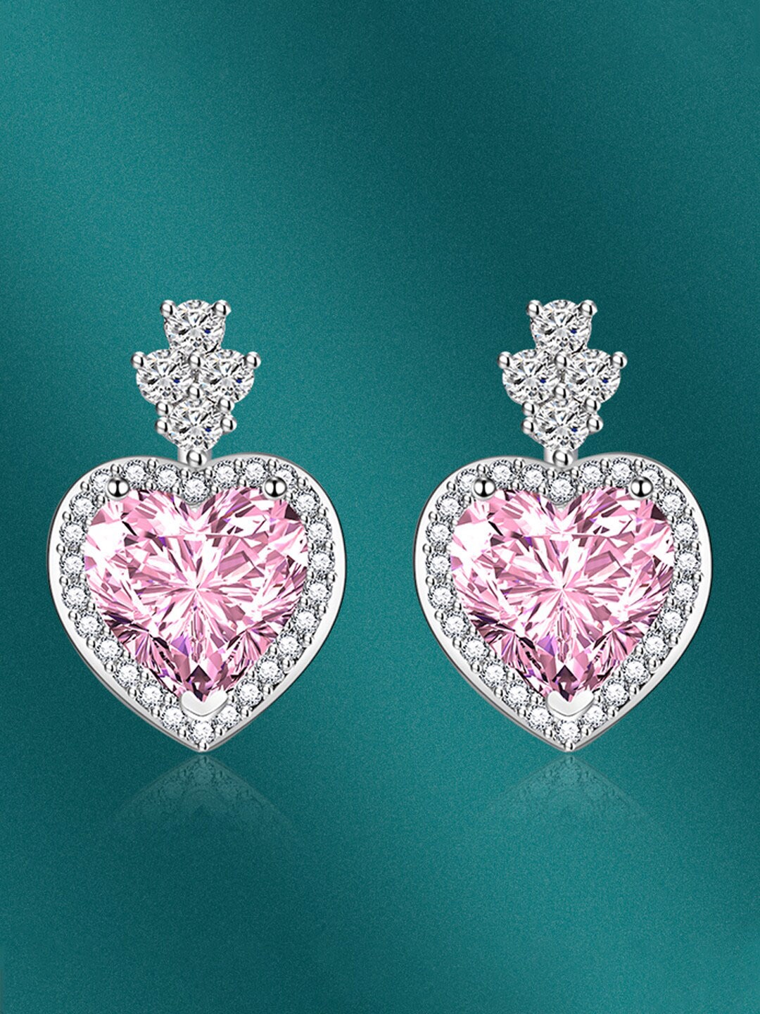 

Designs & You Silver-Plated Heart Shaped Studs Earrings, Metallic