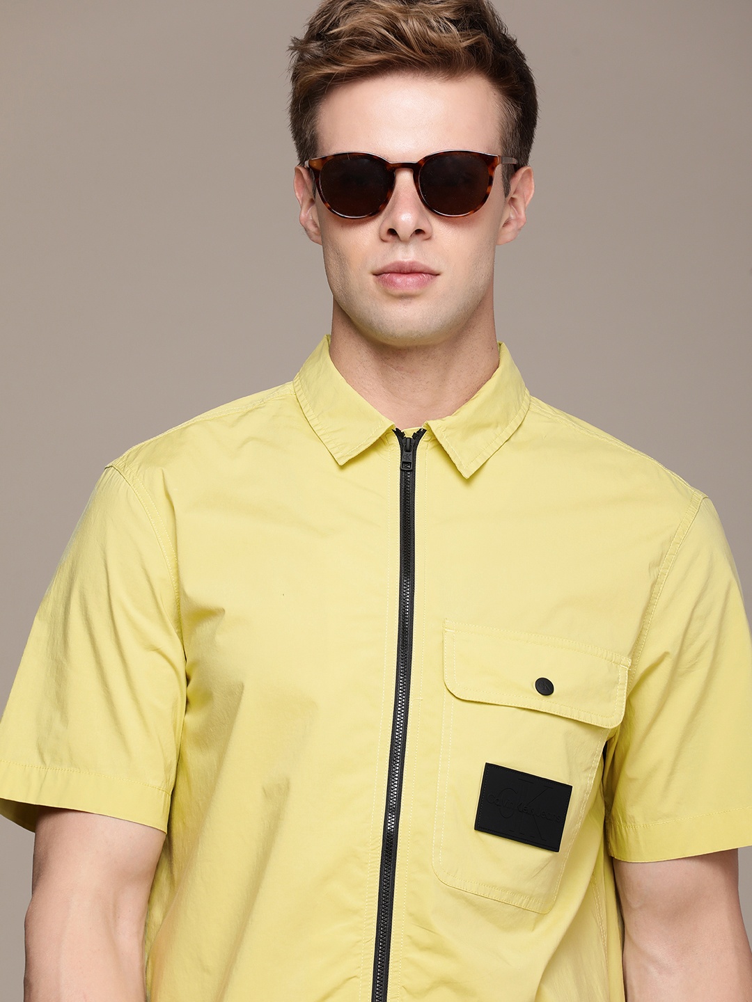 

Calvin Klein Jeans Solid Stretchable Spread Collar Casual Shirt, Yellow