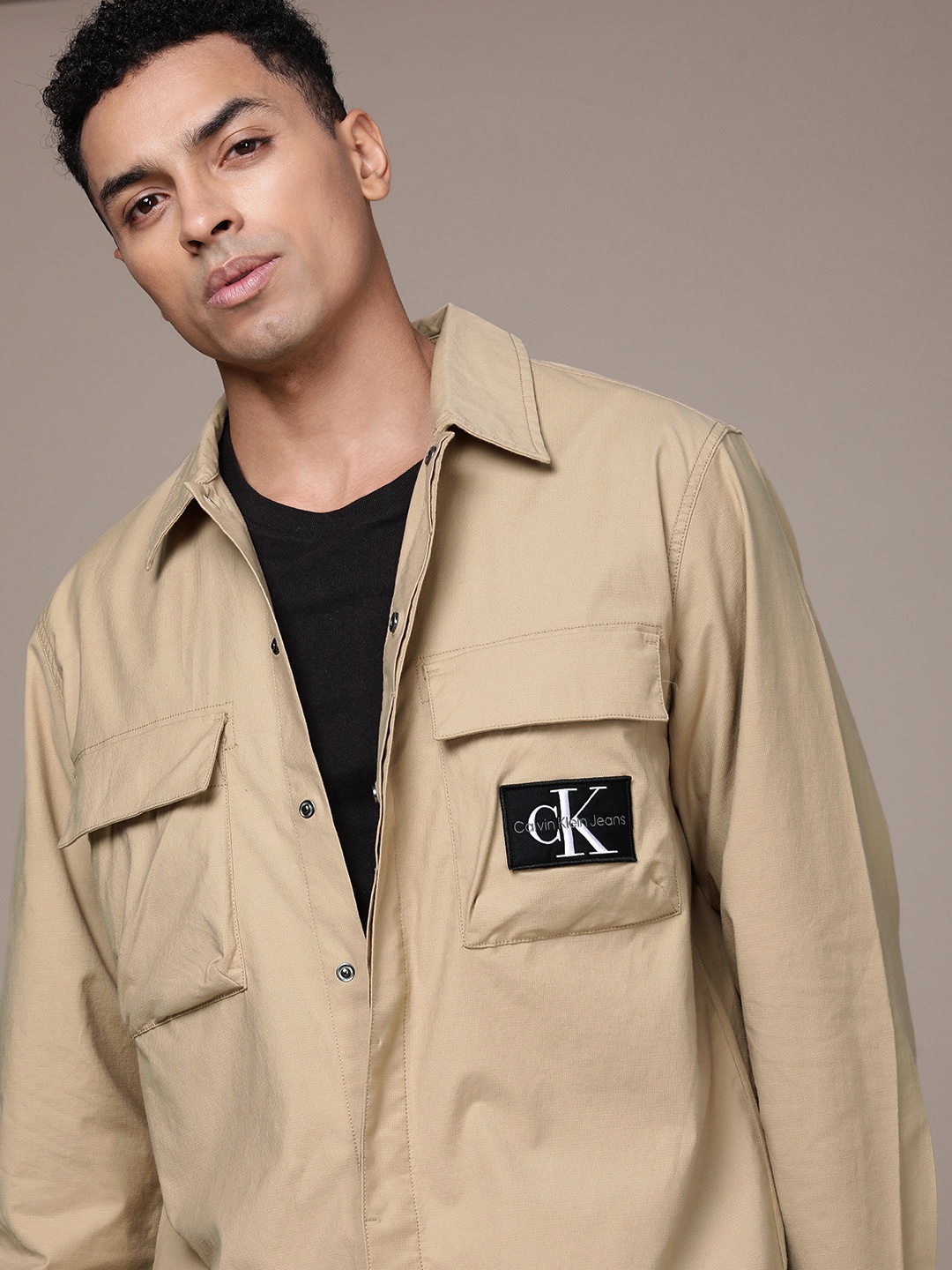 

Calvin Klein Jeans Solid Relaxed Fit Smart Casual Overshirt, Beige