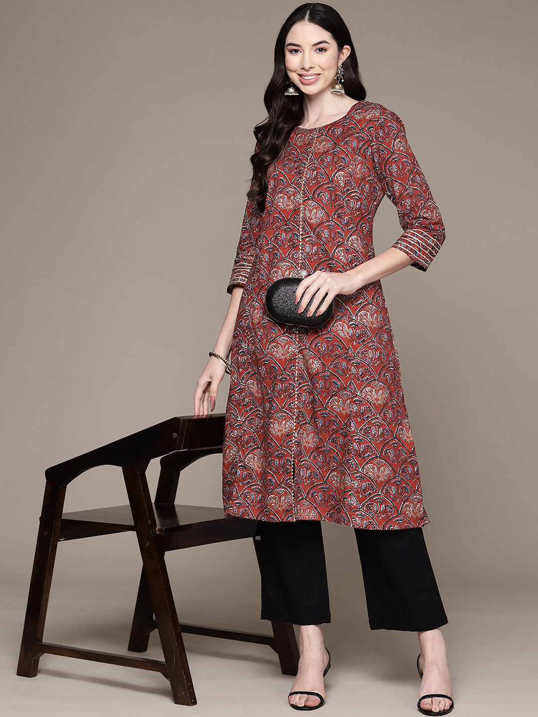

Ishin Women Ethnic Motifs Printed Gotta Patti A-Line Kurta, Maroon