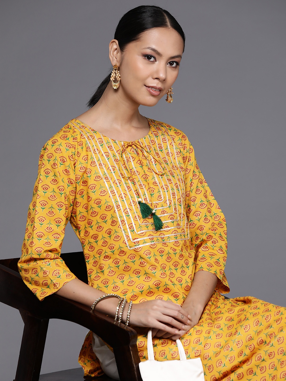 

Varanga Women Floral Printed Gotta Patti Cotton Kurta, Yellow