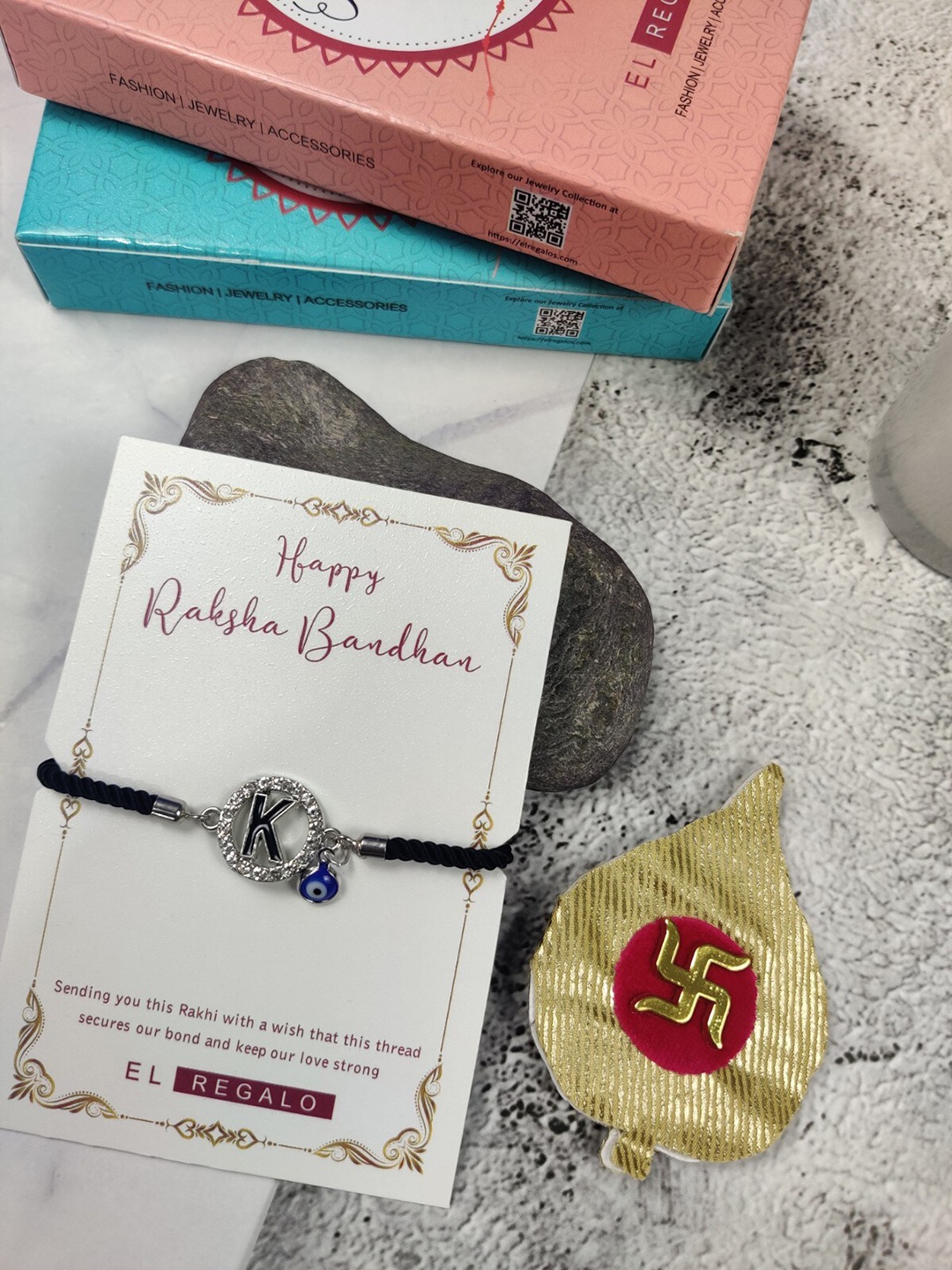 

EL REGALO K Name Initial Evil Eye Rakhi With Roli chawal Card, Black